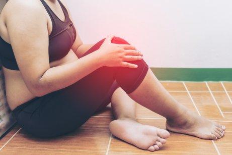 Kvinne med bensmerter